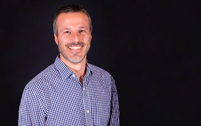 Headshot photo of Dr. Jonathan Dimos