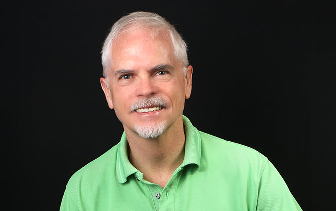 Headshot photo of Dr. Thomas Riley