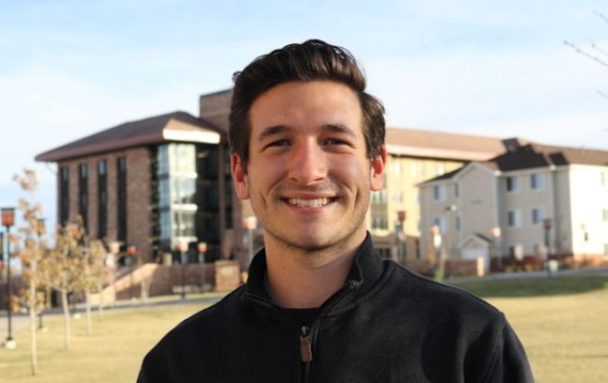 Headshot photo of Marcus Colasuonno