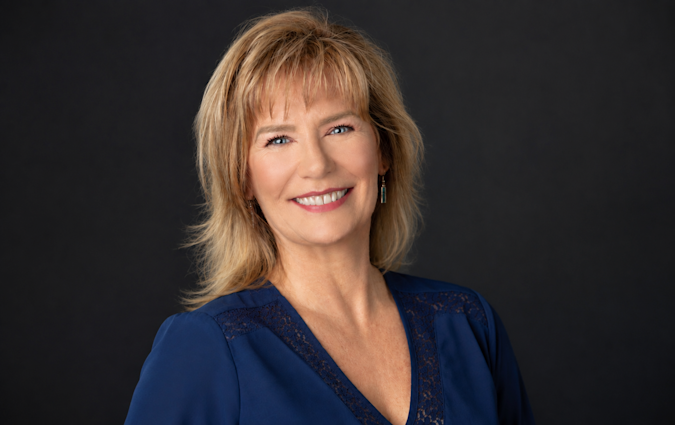 Headshot photo of Carrie Woodson