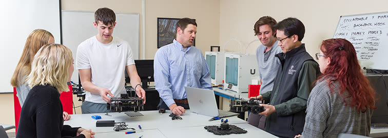 CCU students and faculty in science lab
