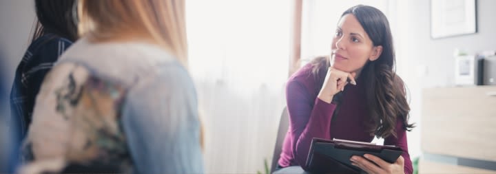 a female christian counselor and two patients