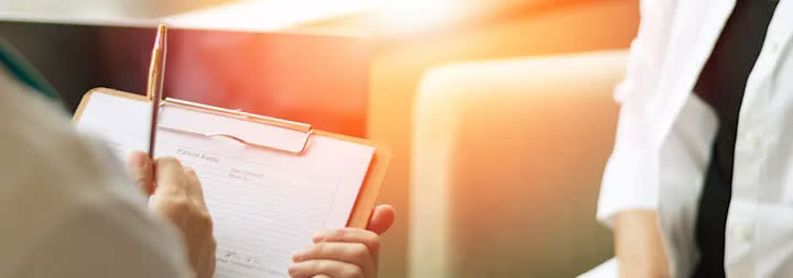 A professional counseling is having a counseling session with a patient.