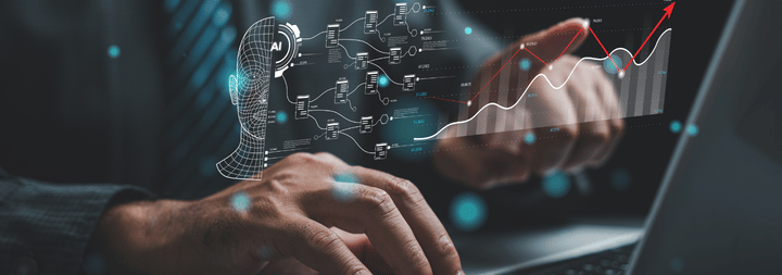 Hands at a computer with a chart and graphic overlaid in the foreground
