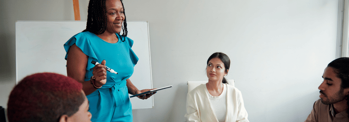 business woman leading meeting