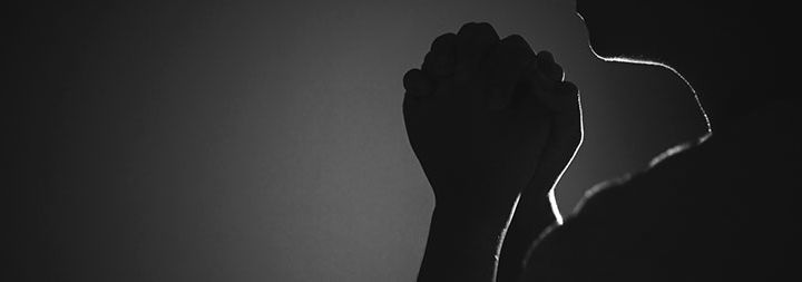 person praying