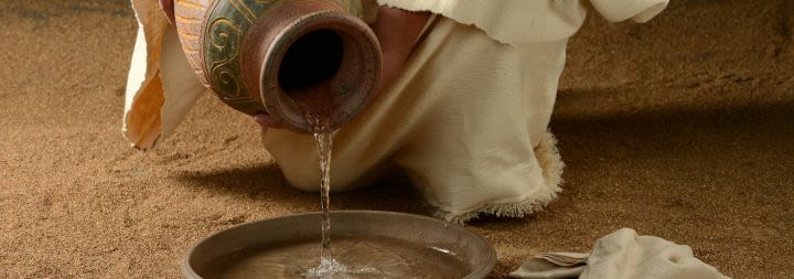 water pouring from jar