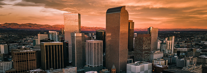 An orange sunset over a cityscape.