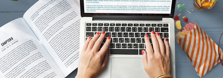 A female student is studying and earning her degree online.