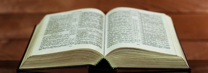 a bible opened on a table 