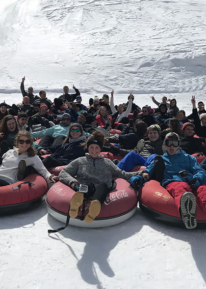 Students Tubing in the Rockies Mesa County logo