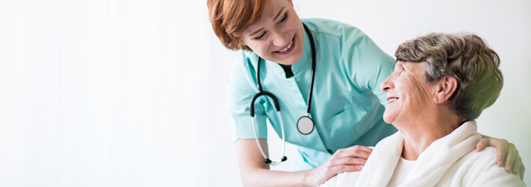 a nurse helping a patient
