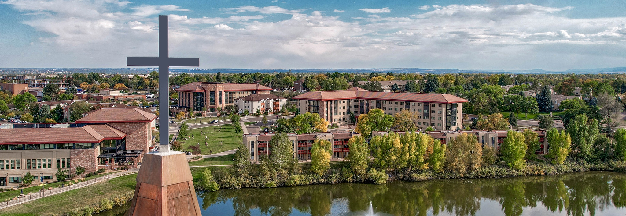 The Armstrong Center steeple in the foreground with CCU Campus in background