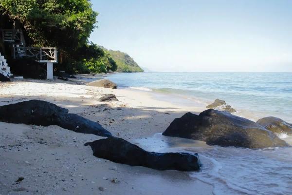 Pili Beach in Pinamalayan Oriental Mindoro with Cream Sand and Rock Formations
