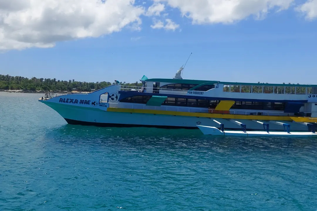 Passenger boat Alexa Mae docked along the shoreline of Jomalig Island in Quezon Province