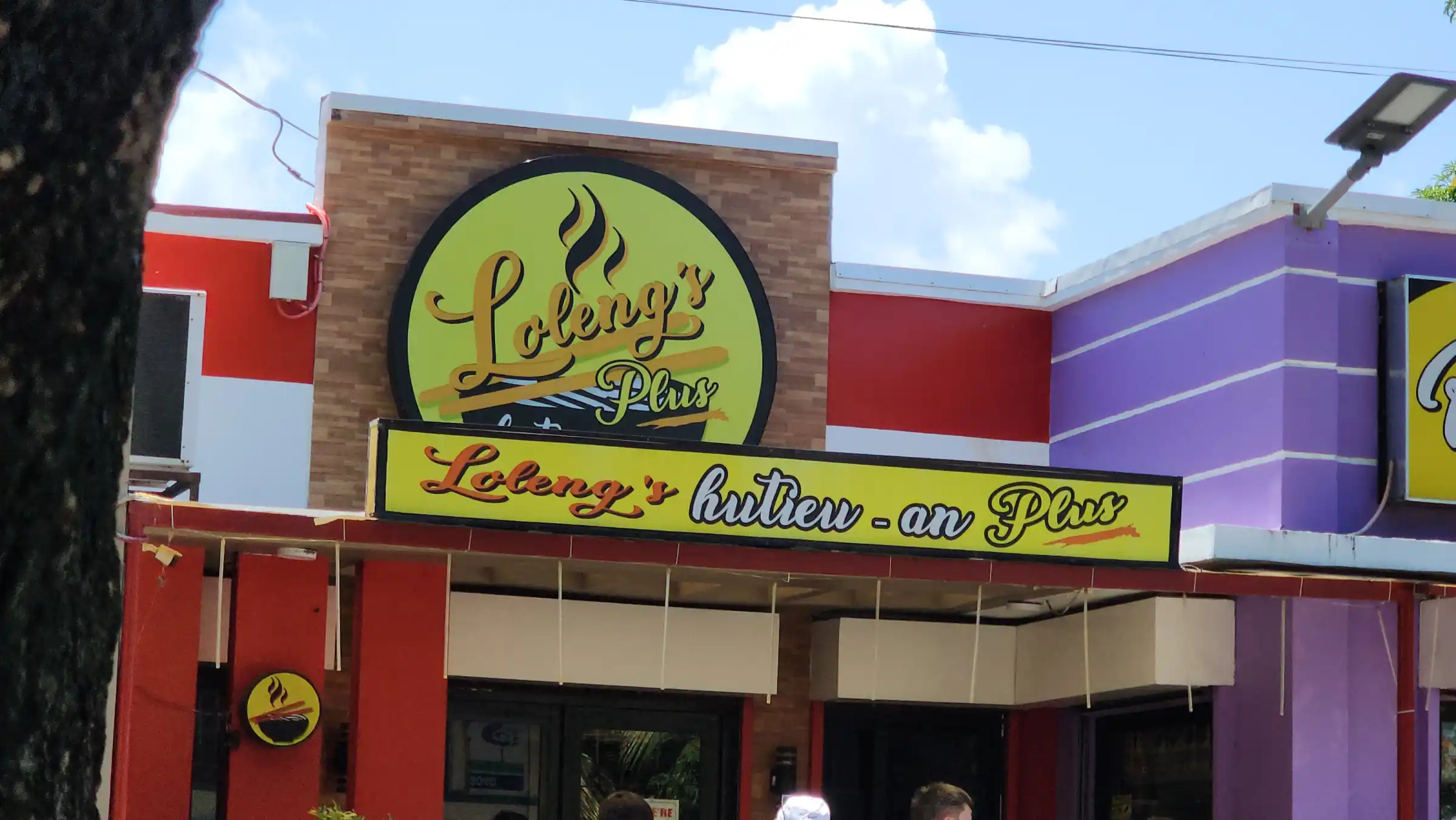 Loleng's restaurant signage above the entrance along the road in Morong Bataan