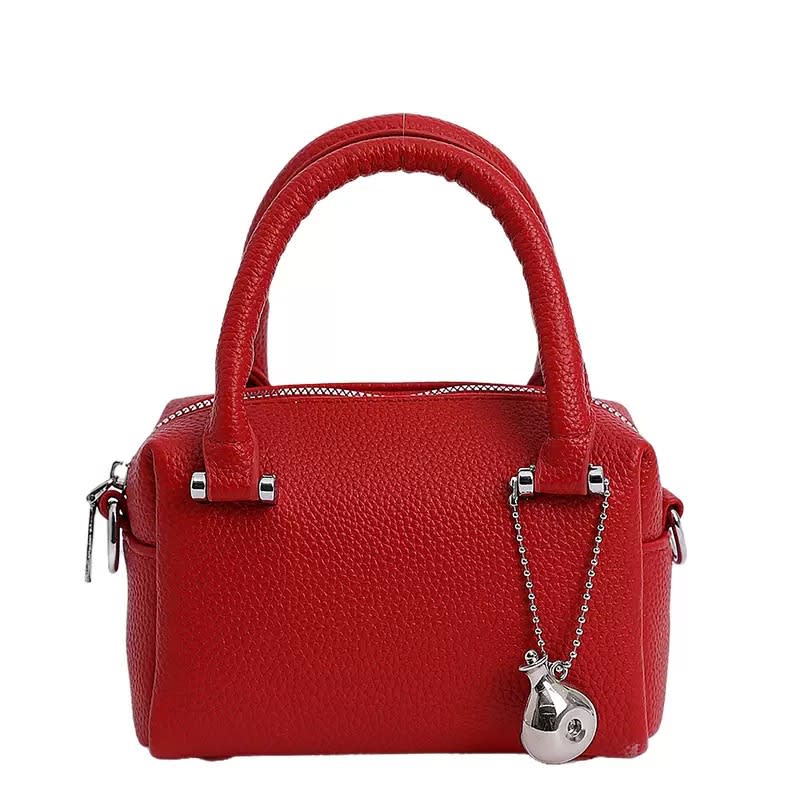 Casual leather bag with pendant