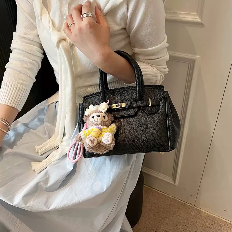 Satchel Bag with pendant - China Import to Ghana