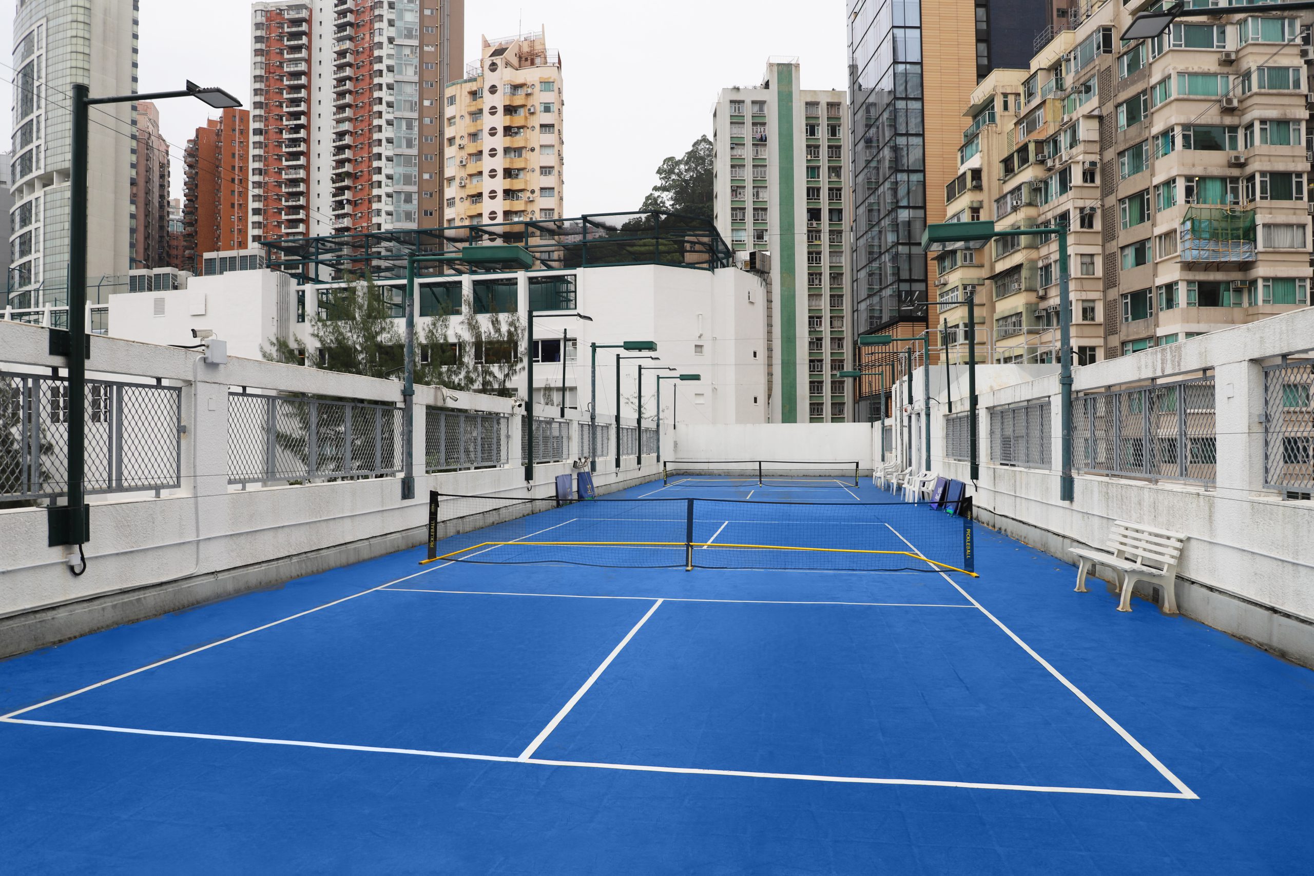 Chinese Recreation Club (HK) – Rooftop pickleball court in Tin Hau