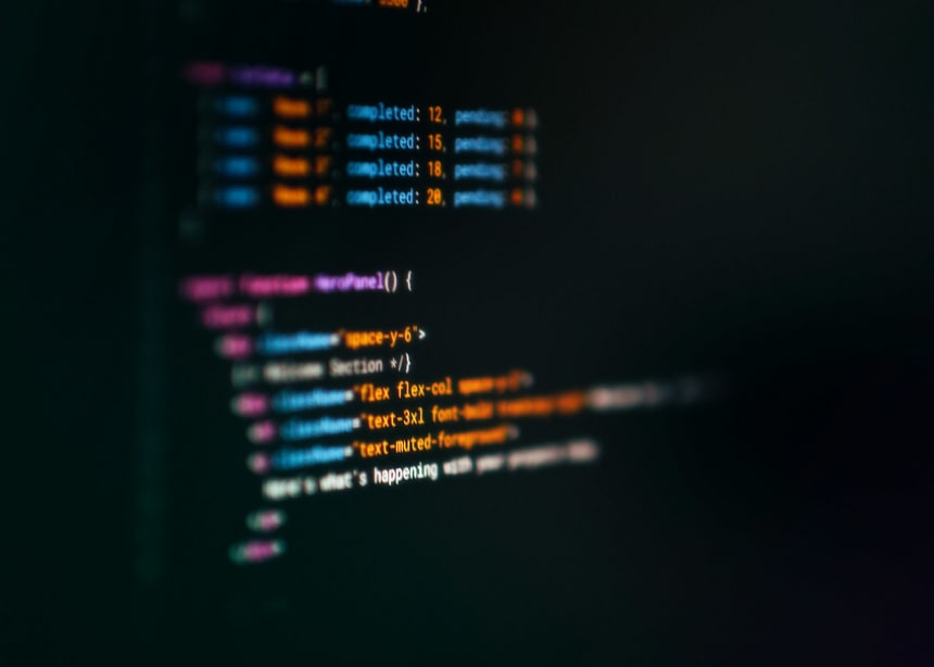 Colorful JSX code in a dark-mode code editor