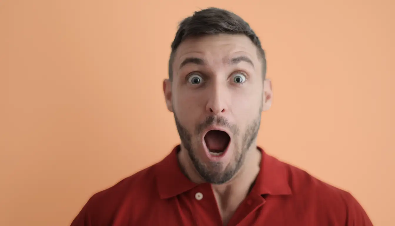 Man with surprised expression representing culture shock for expats
