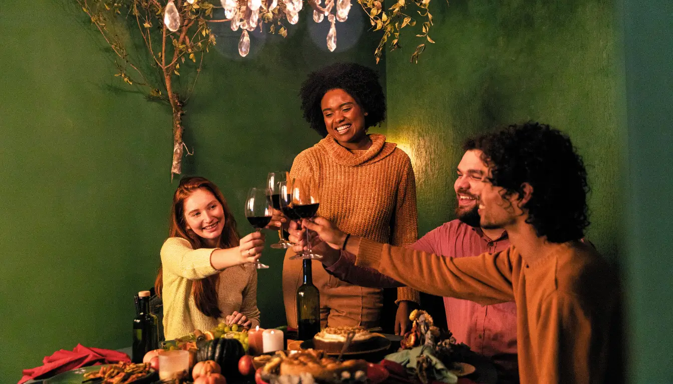 Expats enjoying a dinner gathering and making friends in a new country