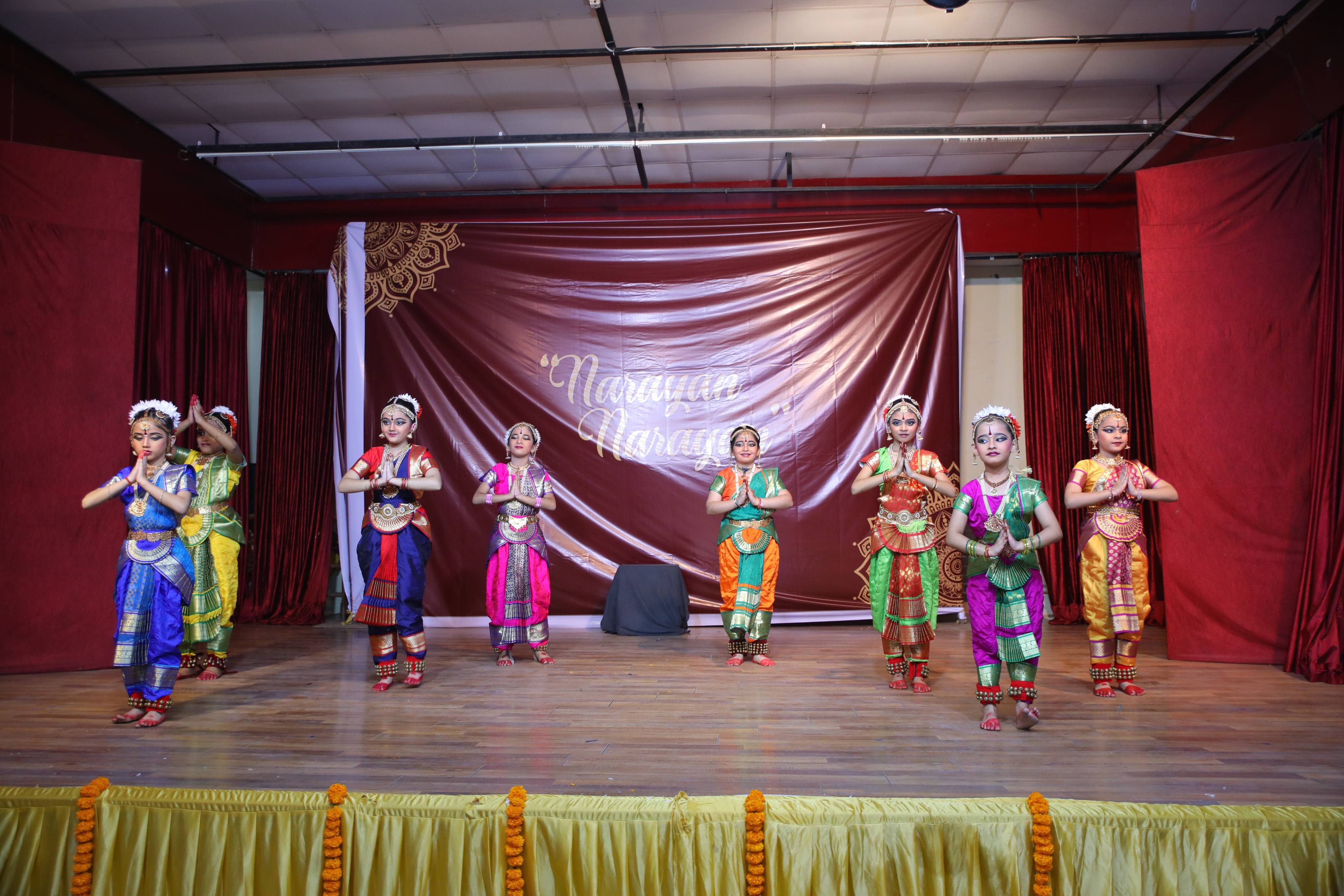 Students learning basic steps of Narayan Narayan