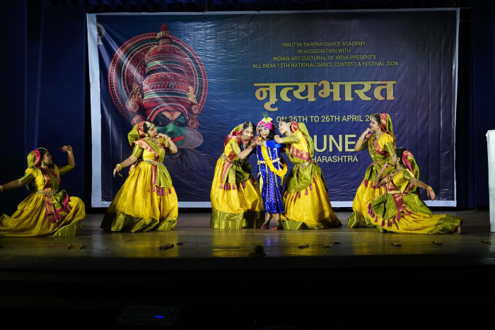 Students learning basic steps of Prem Vinod