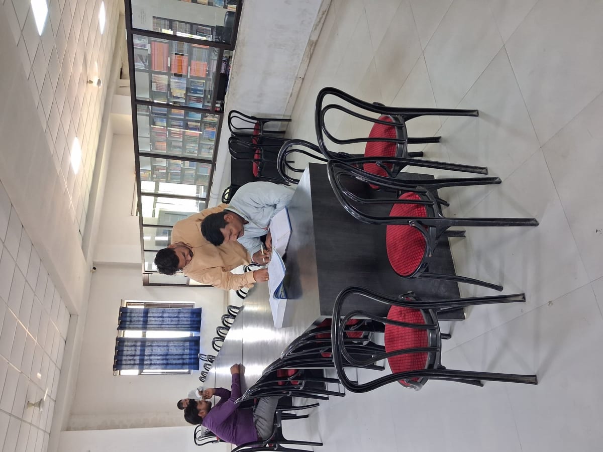 BIPE library — reference texts and shelves