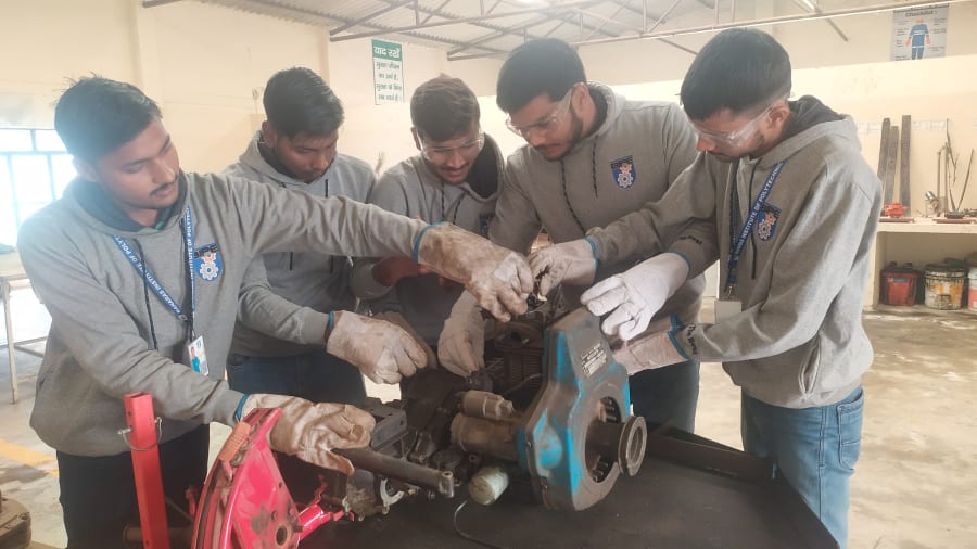 Automobile lab on the mech production floor — engine teardown station