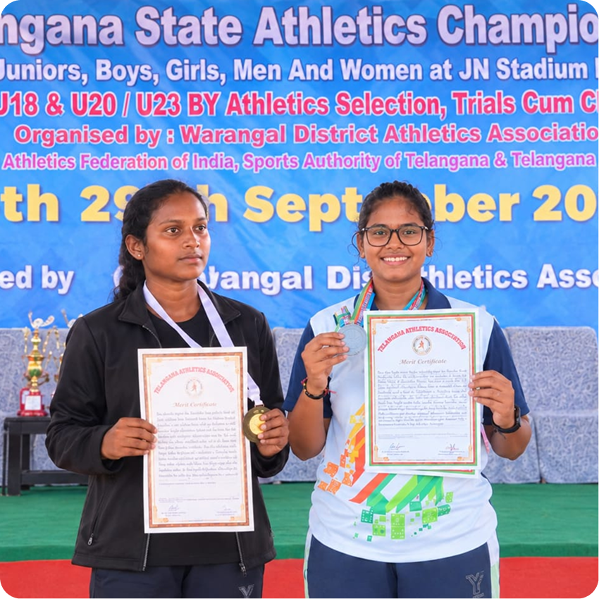 Young athletes holding their achievement certificates