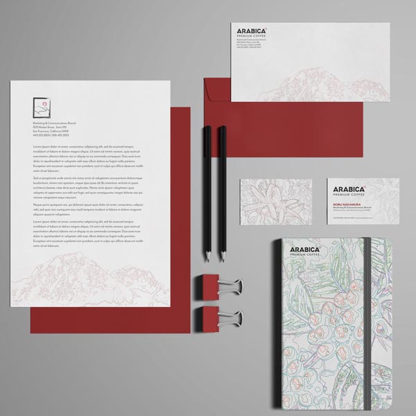 Various Arabica stationary items laid out on a grid