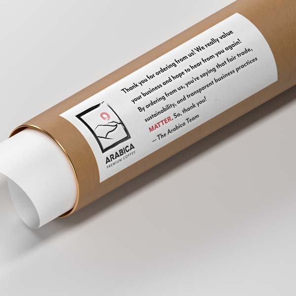 A picture of a shipping tube with a label that has the Arabica logo and a company message.