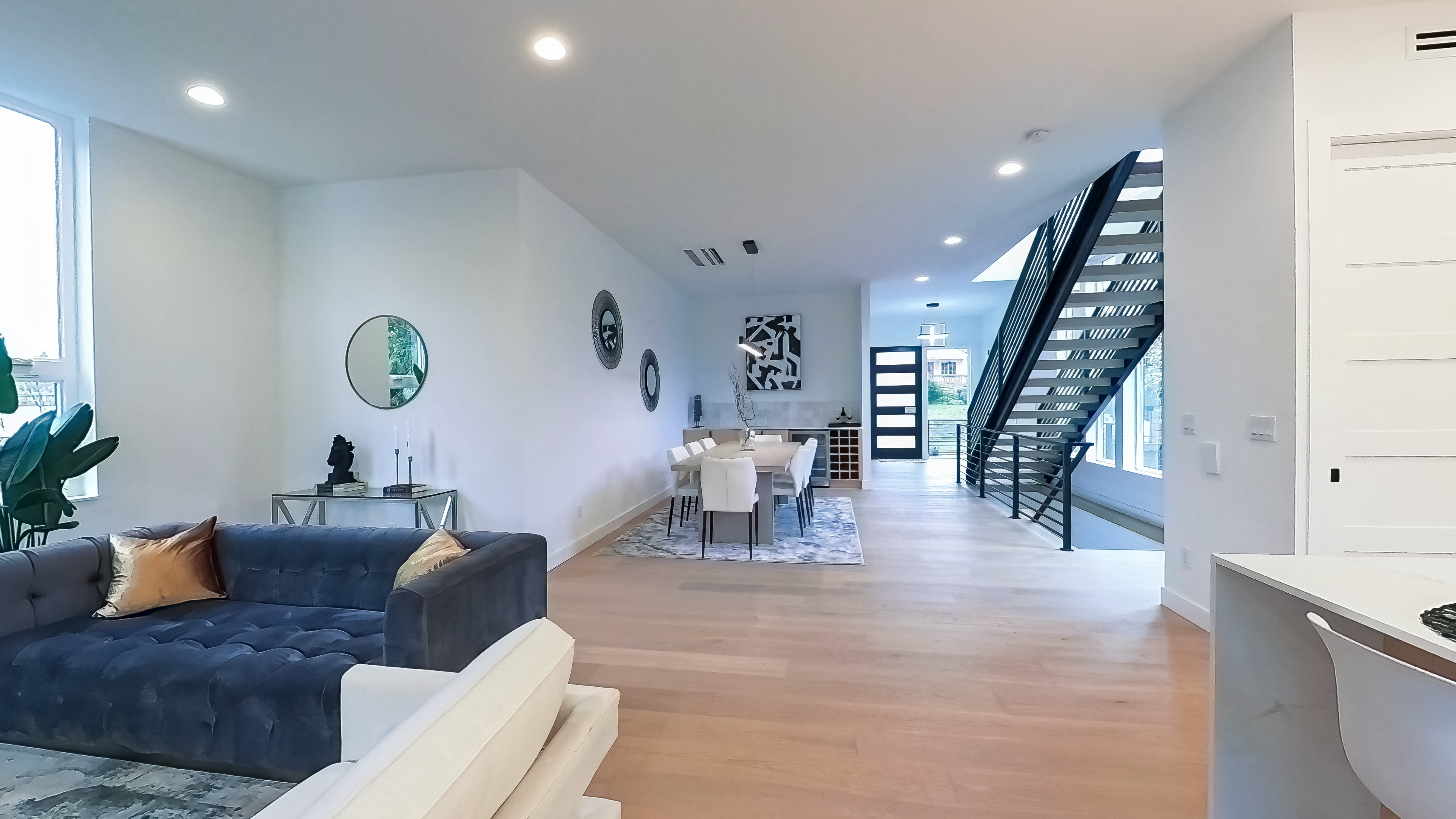 360 degree rotational view of a modern luxury home interior dining and kitchen area