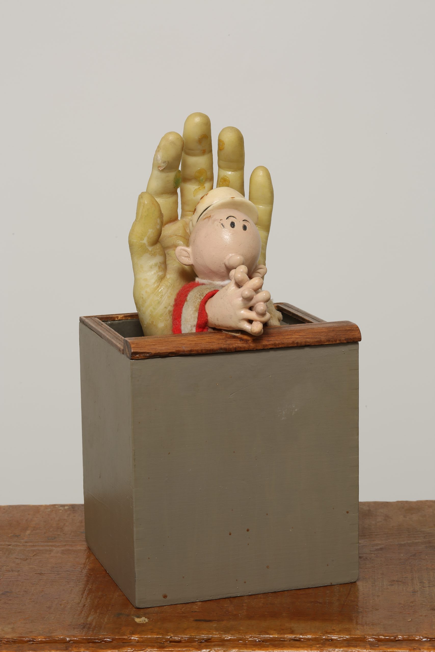 Untitled (Hand Over Popeye Character)