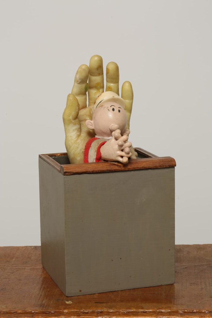 Untitled (Hand Over Popeye Character)