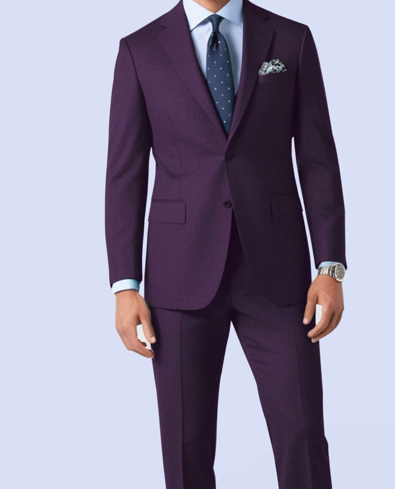 Close-up of royal purple bespoke suit jacket featuring notch lapel, two-button closure, premium buttons, and refined tailoring details.