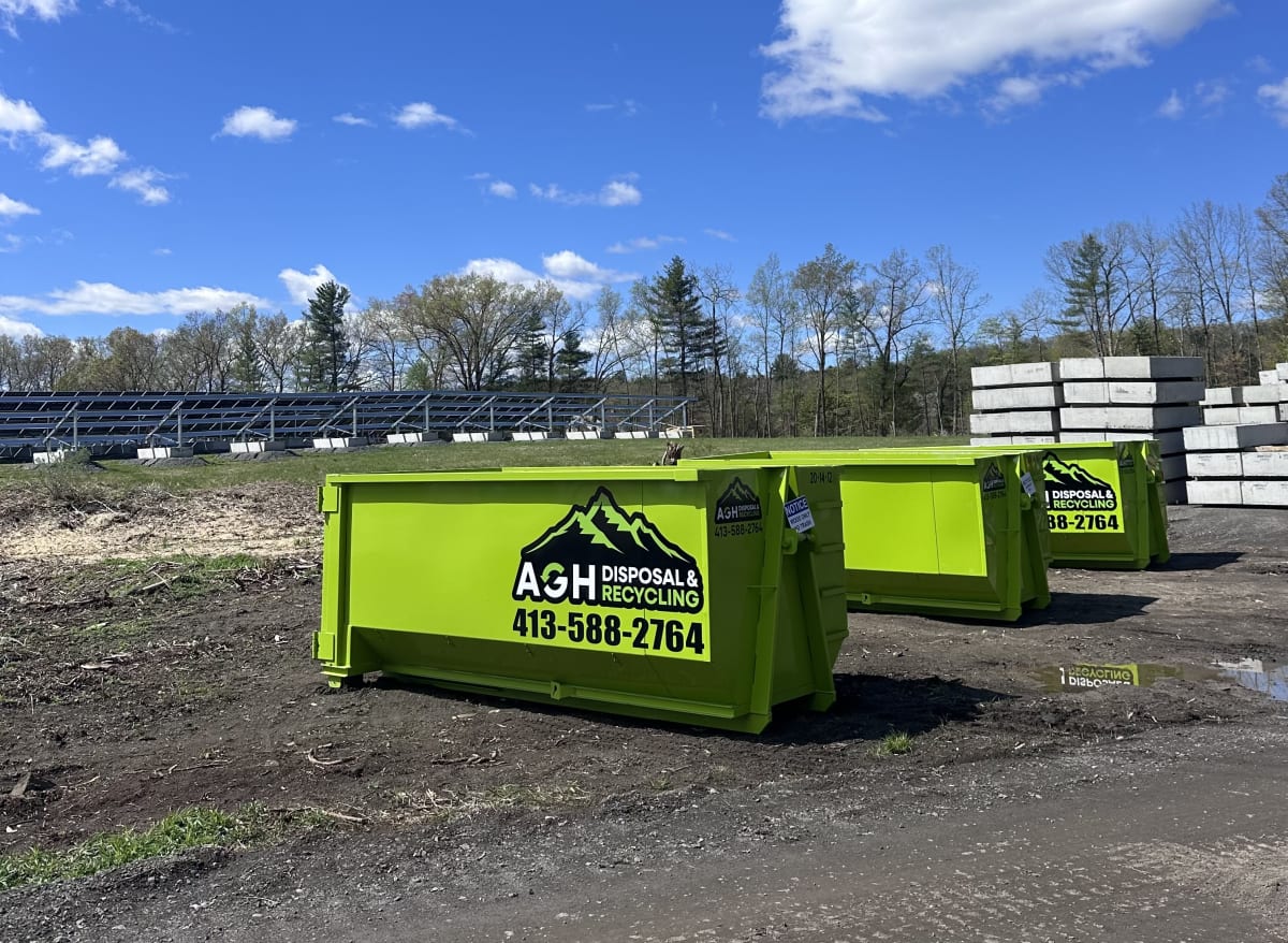 AGH roll-off dumpsters on a job site