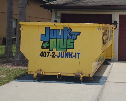 Roll-off dumpster placed for a residential cleanout in Orlando FL