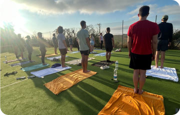 Heyflow Team doing yoga in Tuscany