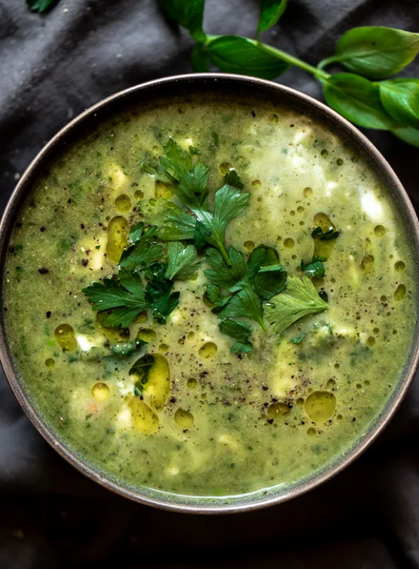 Spinach, mushrooms and tomatoes are cooked in spiced coconut milk to yield a broth of tender, flavourful, nutrient-packed greens