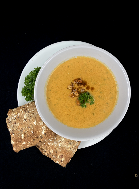 This coconut ginger carrot soup is an easy recipe, with great flavours of garlic and cumin. Pair with toasted bread