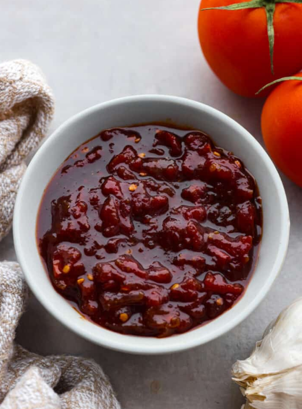 Sweet & spicy tomato chutney is the perfect accompaniment to Indian meals. You will love it with paratha or your sandwiches