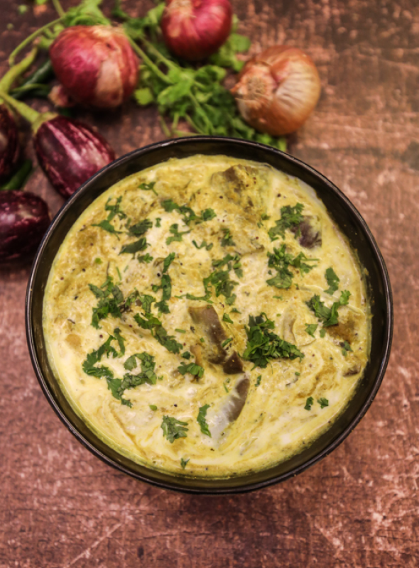 Dahi Baigan is a unique way of preparing eggplant mixed with yogurt and is mildly spiced. Pair with roti/chapati