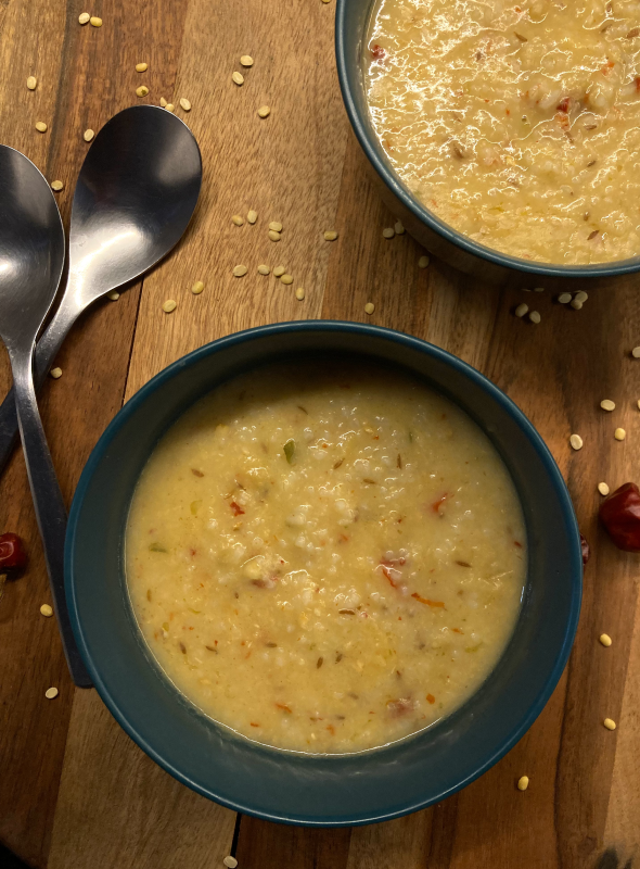 Pongal is a delicious South Indian porridge made with rice and yellow moong lentils and laced with the wonderful flavors of cumin, asafetida, curry leaves, ginger, and chilies. Pair with Curd/Sambar or Coconut Chutney