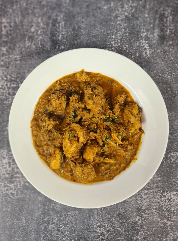 This chicken recipe is made with whole spices and dry coconut roasted in oil. The marinated chicken is cooked with onions, ginger, and garlic to give a quick chicken recipe with delicious, aromatic flavors which make it irresistible. Pair with Roti/Naan