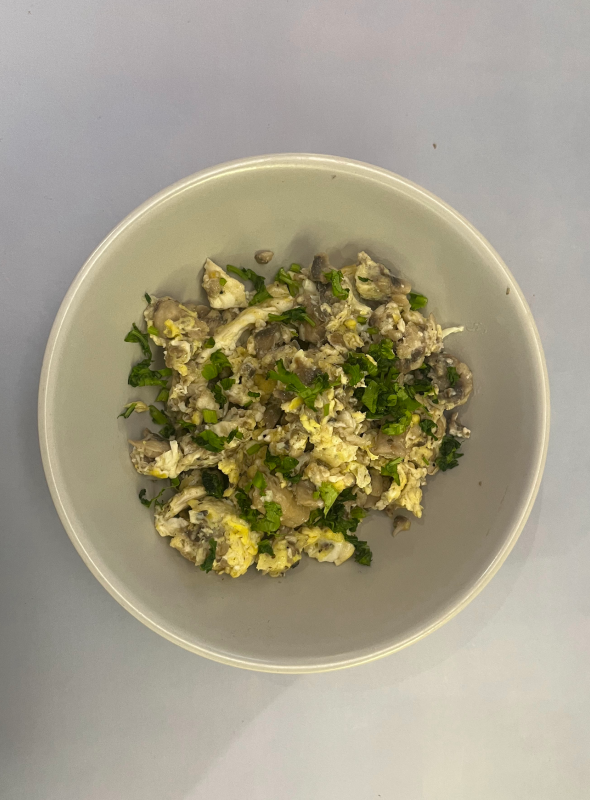 Eggs cracked over stir-fried mushroom, a protein packed scrumptious breakfast or snack