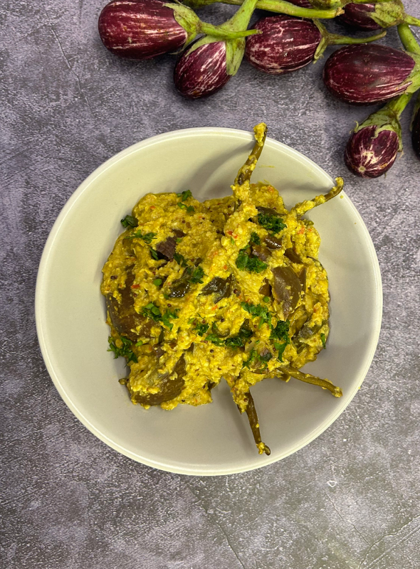 This recipe is made with tender and small eggplant in a peanut and coconut-based gravy. The recipe mainly hails from Andhra cuisine or Telugu cuisine but is popular among other South Indian states too. Pair with Roti/Rice