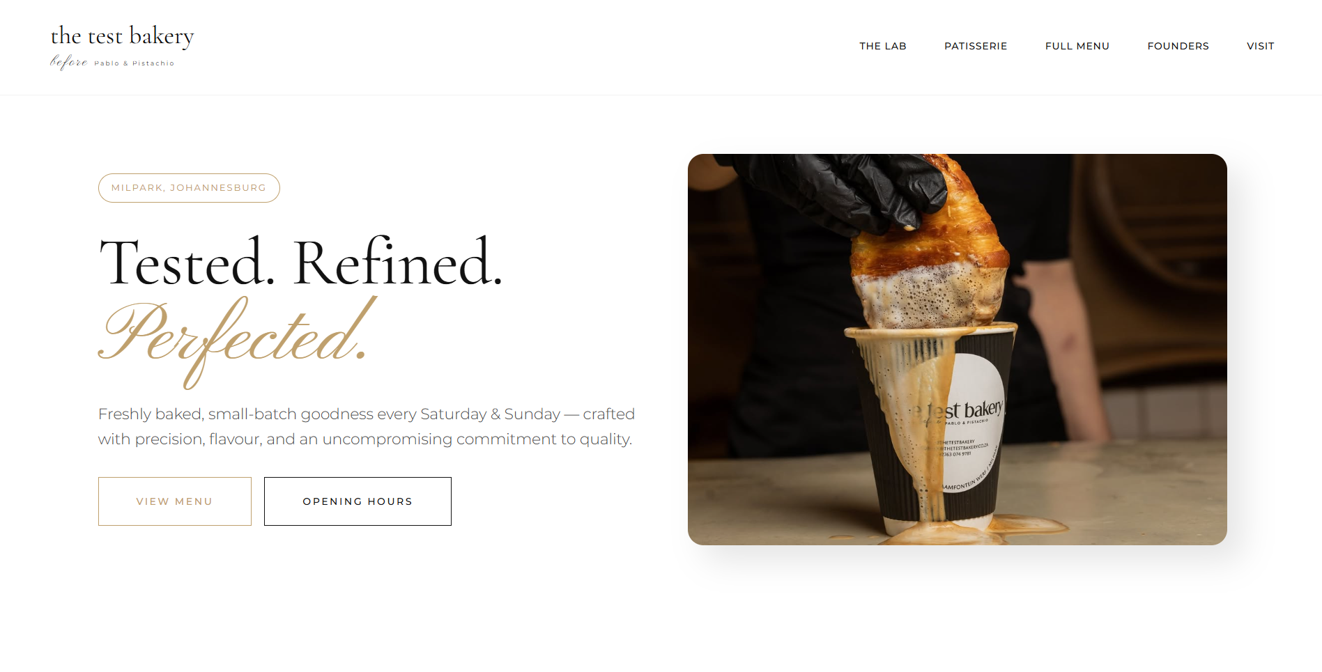 The Test Bakery landing page featuring artisan sourdough photography and the "Precision Meets Passion" hero section.