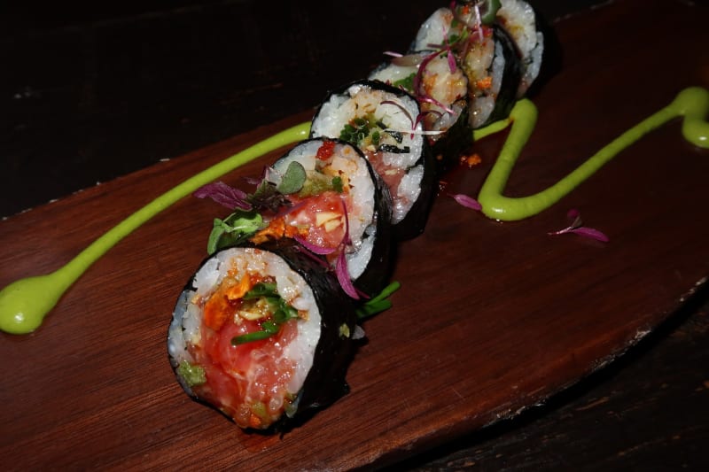 Chef-led counters, imported fish, and artfully plated perfection.